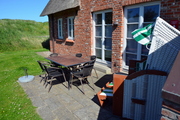 Terrasse mit Blick 
auf den Deich
